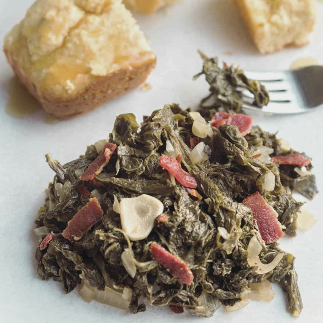 A plate of mustard greens with some cornbread just calling my name. 